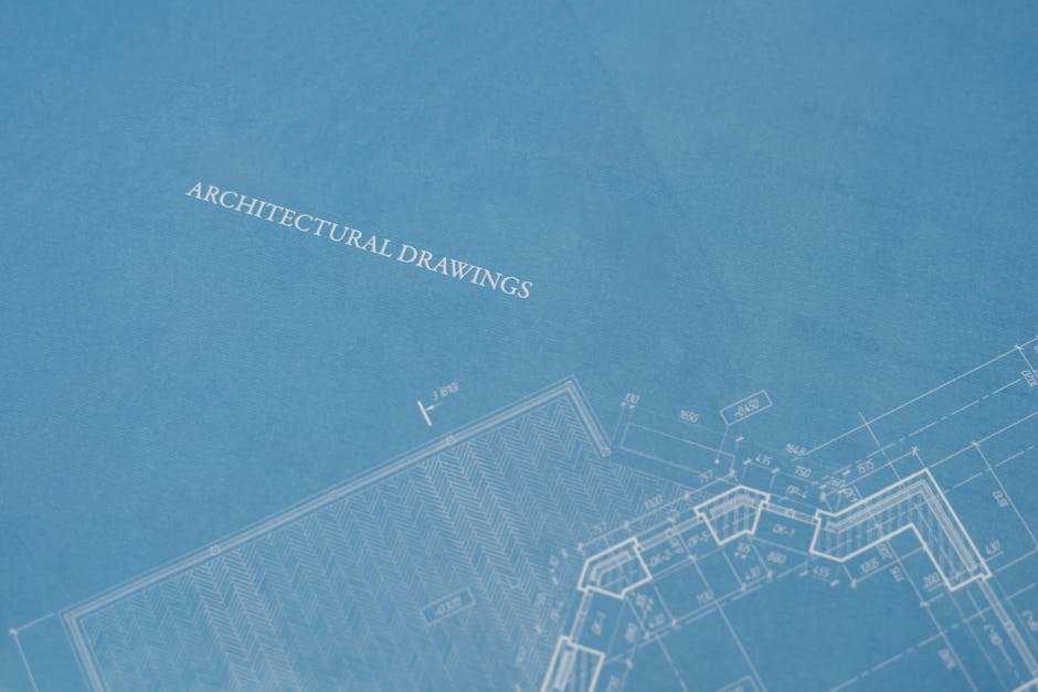 Close-up view of architectural blueprint with technical drawings